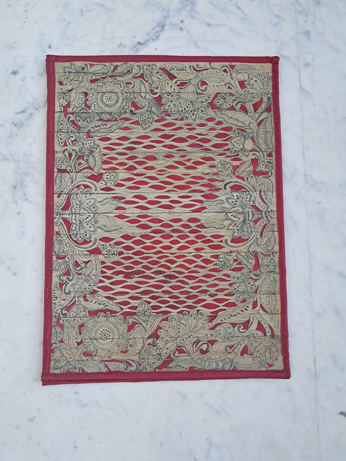 Palm Leaf Placemats with Red Colored Borders.