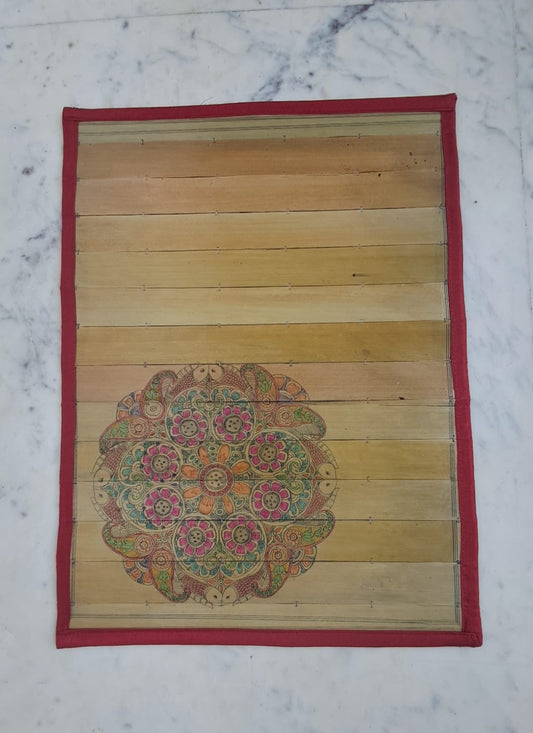 Palm Leaf Placemats with Red Color Borders with Colorful Design in Corner Side.