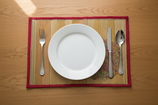 Palm Leaf Placemats with Red Color Borders with Colorful Design in Corner Side.