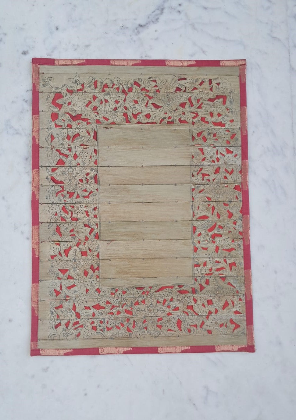 Palm Leaf Placemats with Red & Golden Colored Borders.